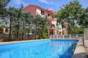 Family friendly apartments with a swimming pool Krnica, Marcana - 3029